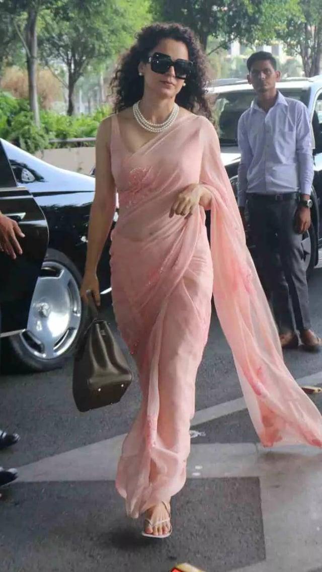 Kangana radiated elegance and grace in a stunning pink saree. The soft, blush hue highlighted her natural beauty and complemented her complexion. 